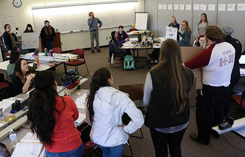 Dr. Boudreaux facilitates student whiteboard presentations