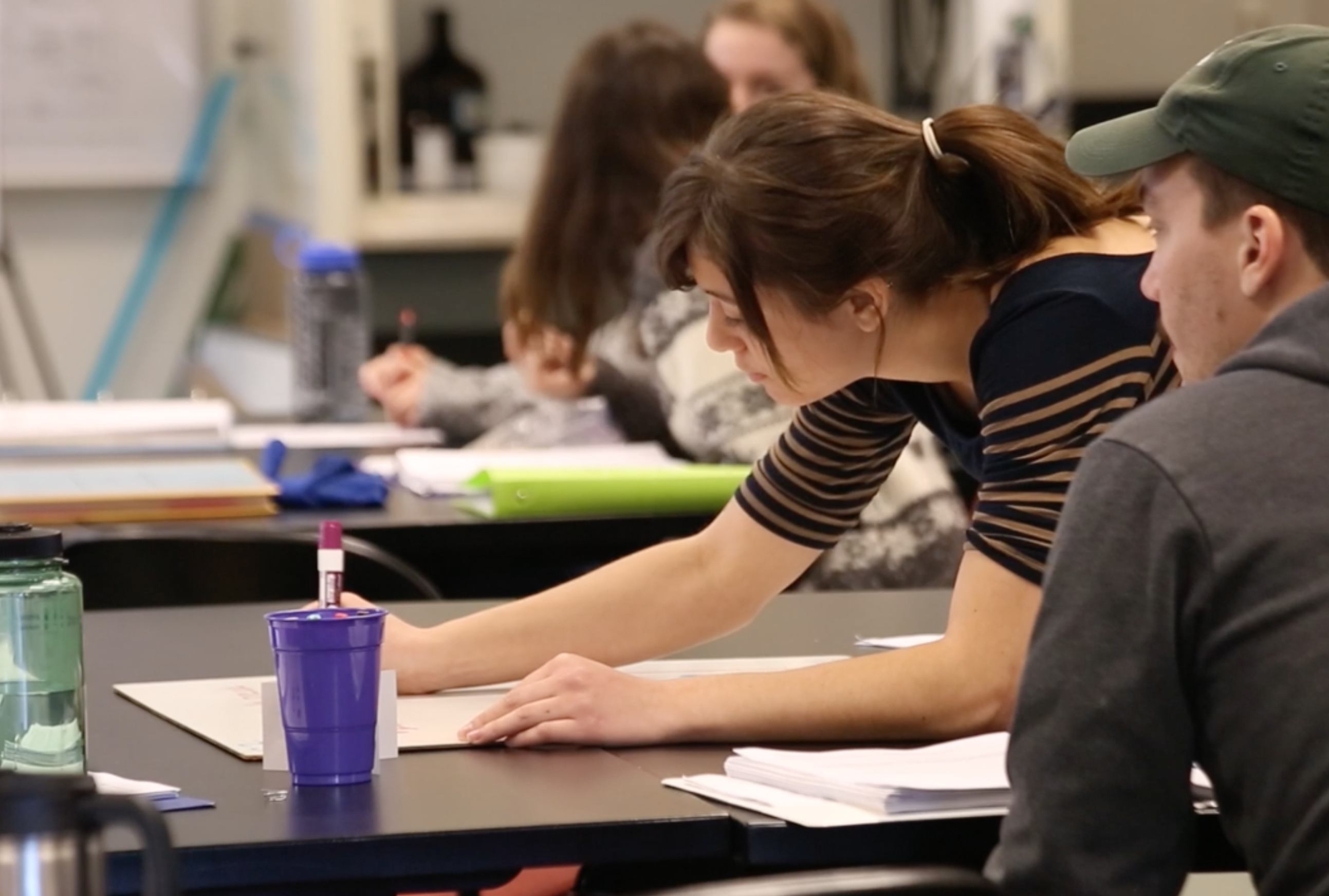 Writing on a whiteboard describing the classroom norms