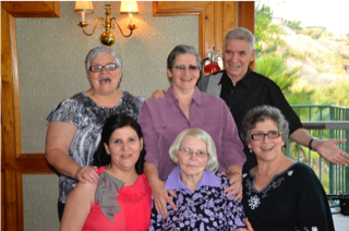 A group photo of Ferreras-Stone and her family