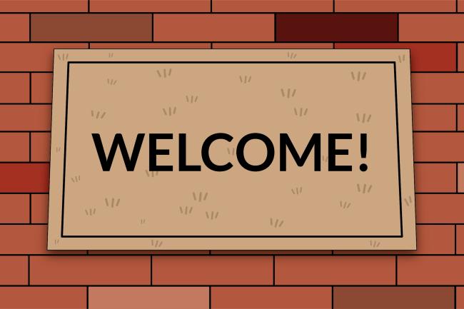 Welcome to Western! A doormat greeting on a brick background 